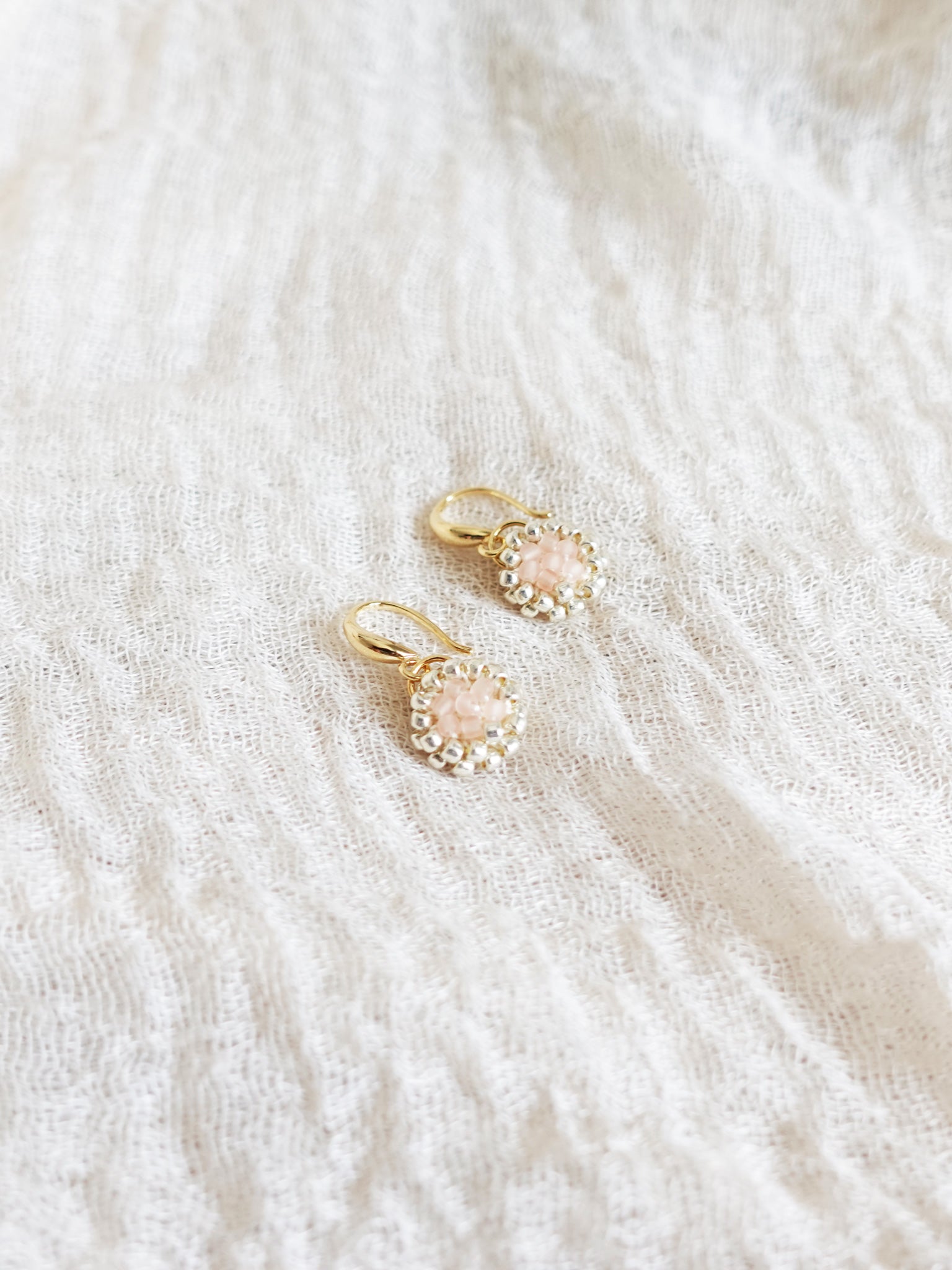 Polly Drop Earrings in Blush Pink Left