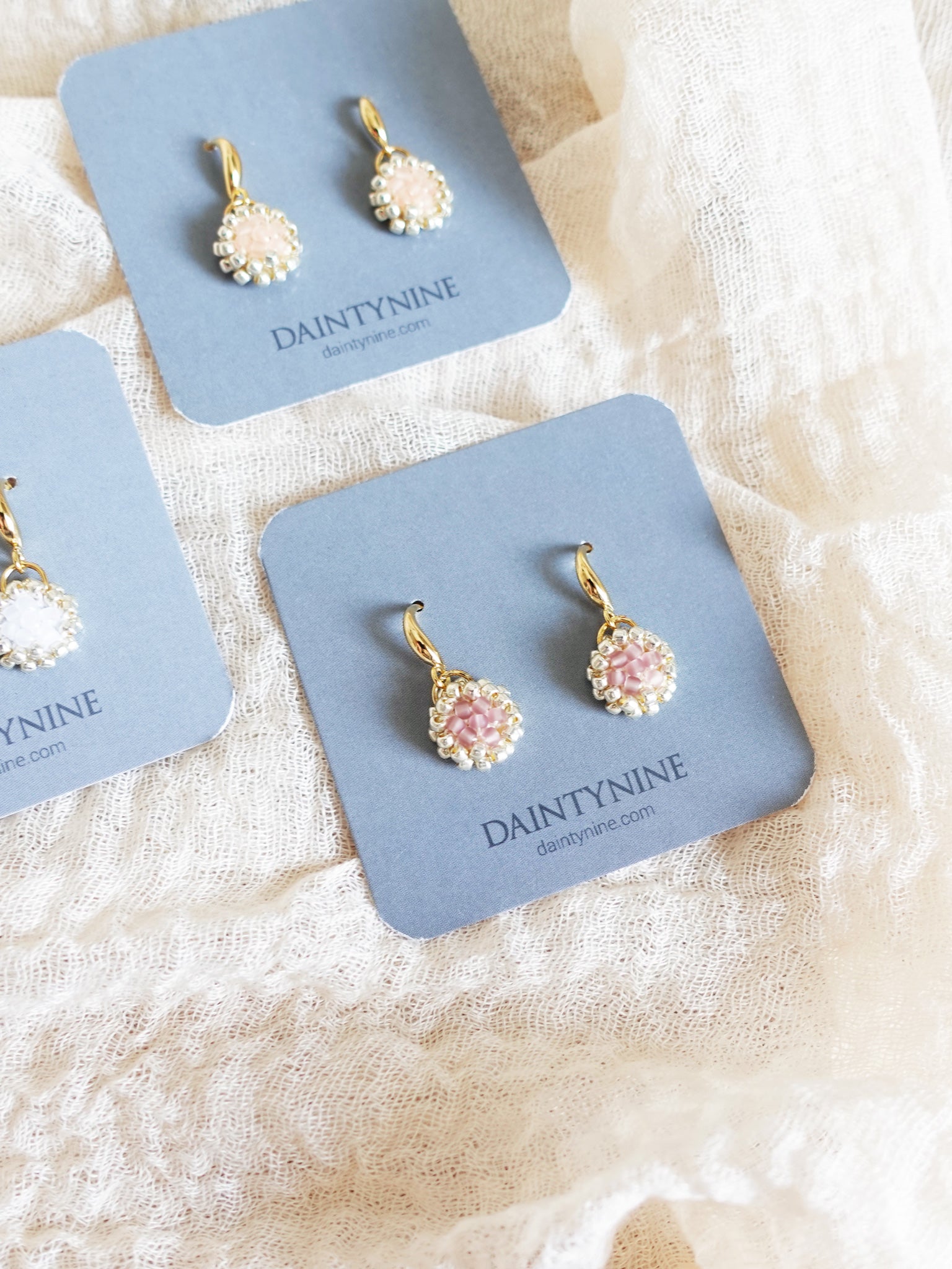 Polly Drop Earrings in Mauve Purple Card