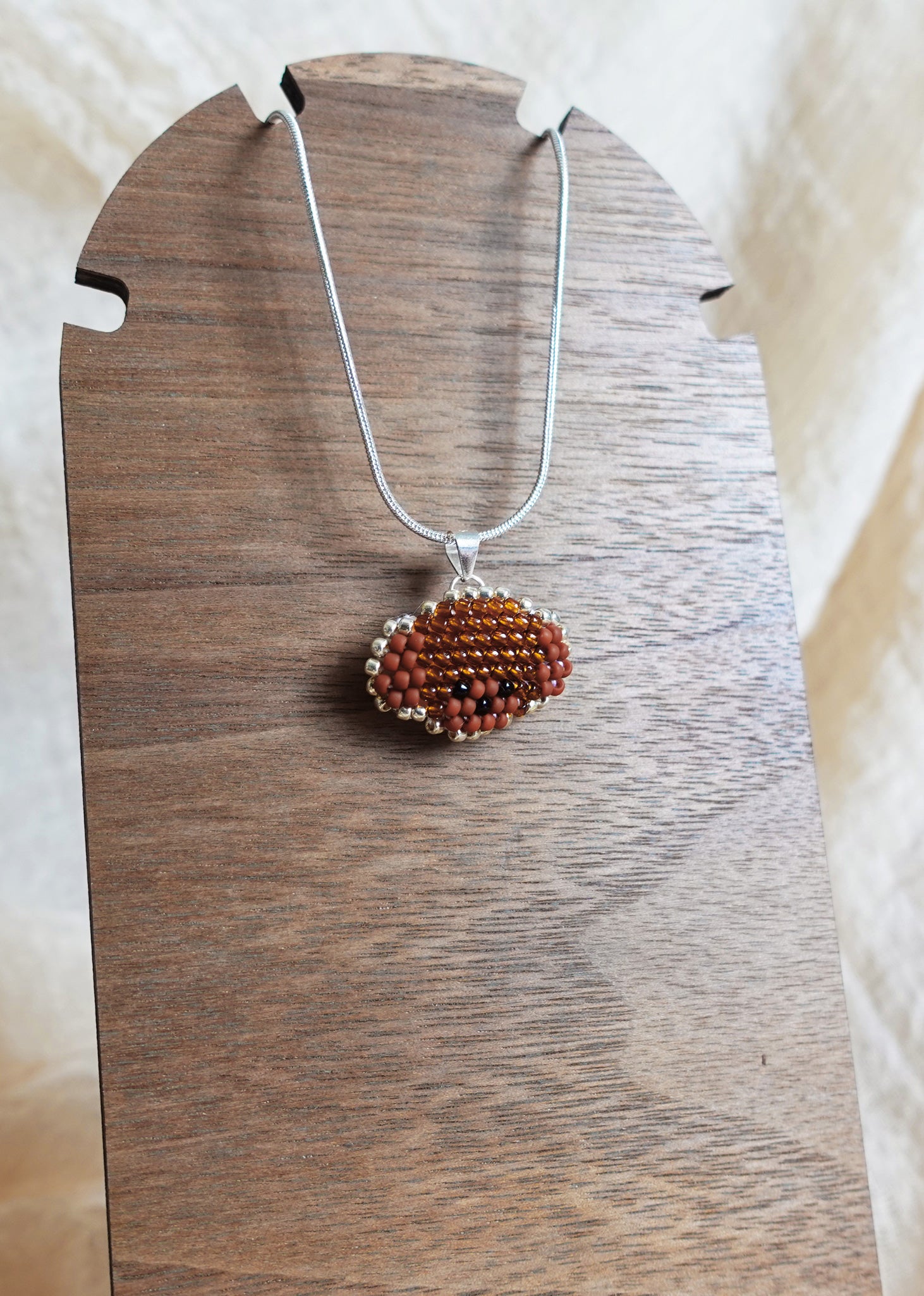 Poodle Necklace in Brown Display Left