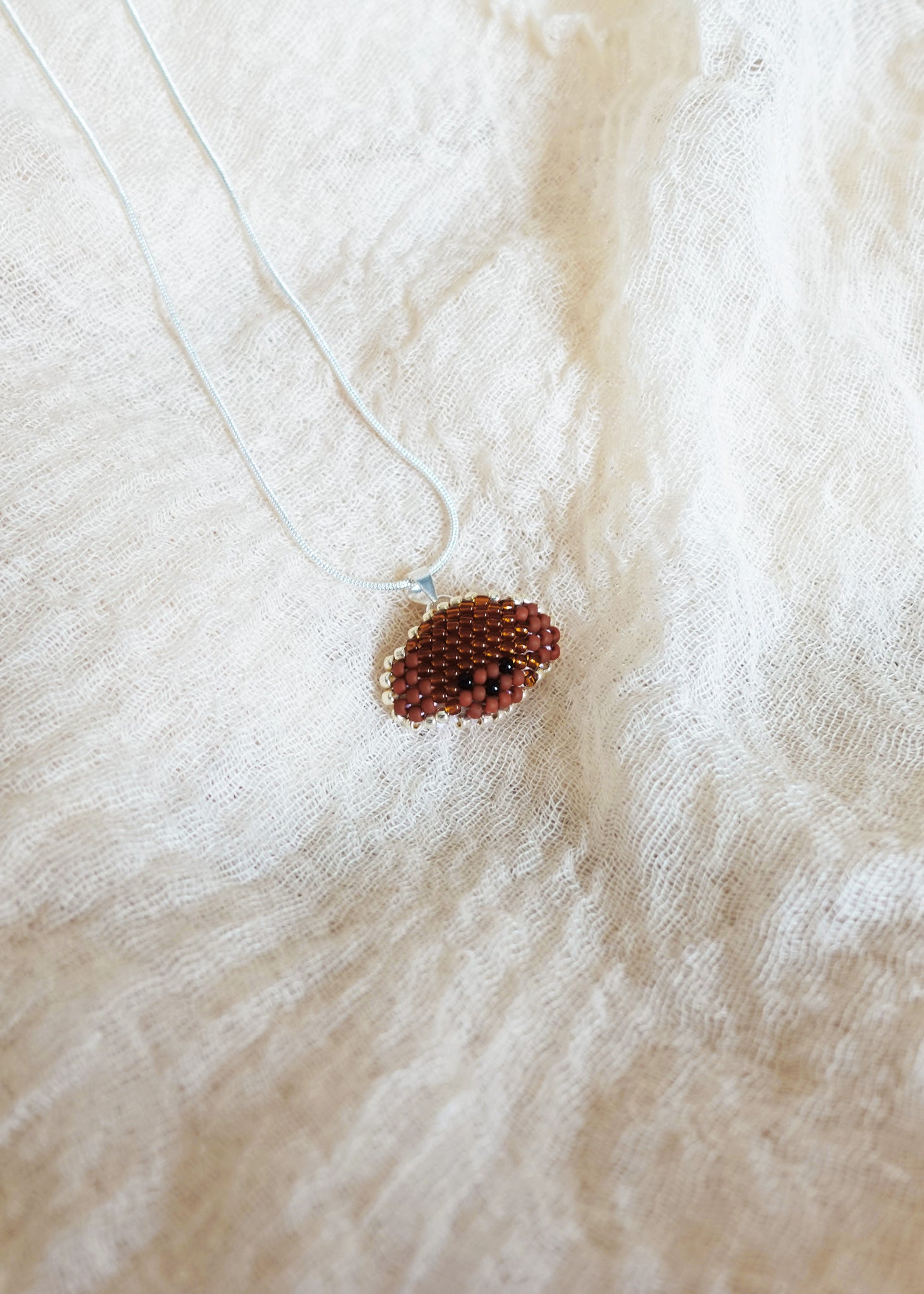 Poodle Necklace in Brown Left