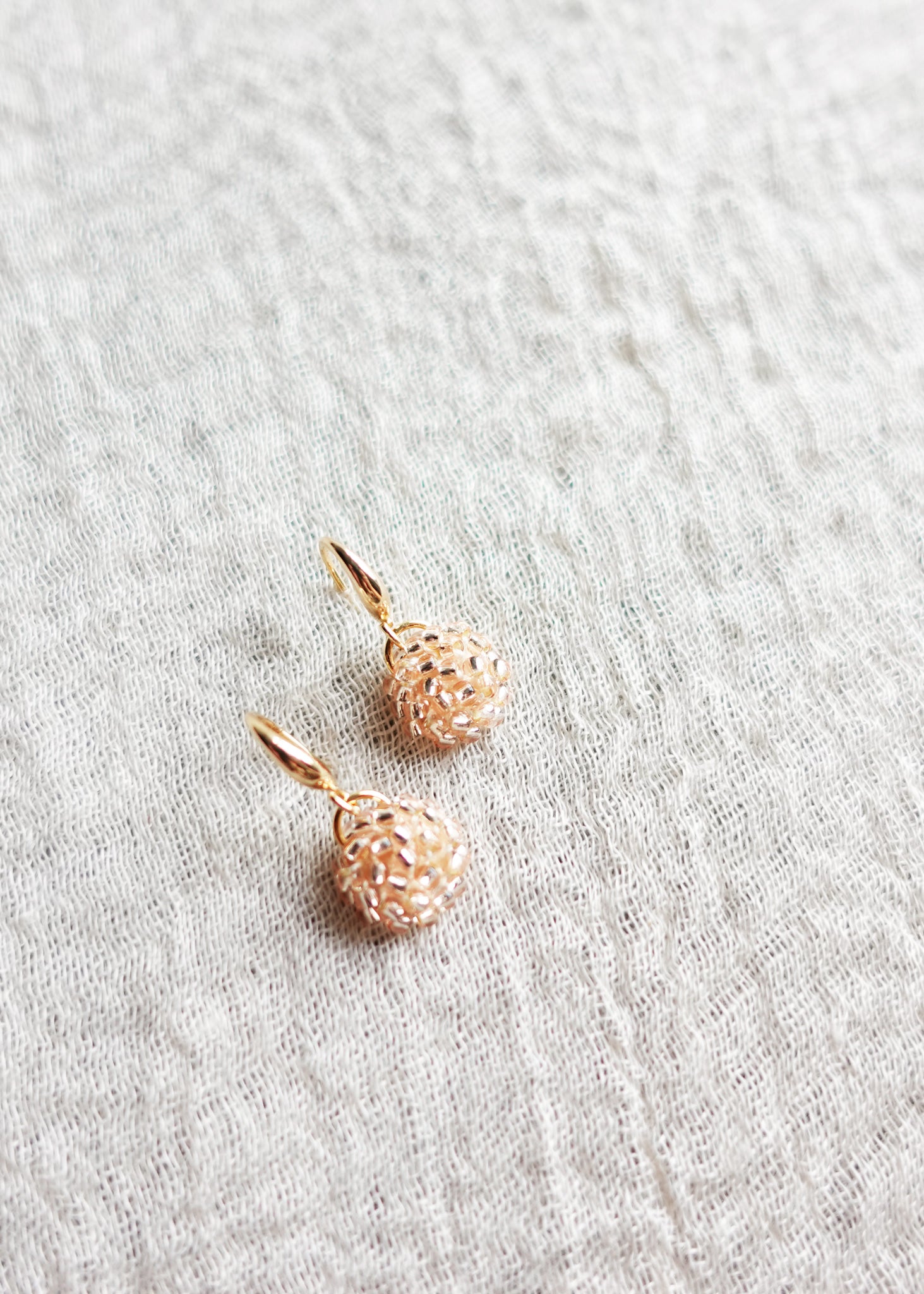 Prelude Drop Earrings in Champagne Pink Left Front