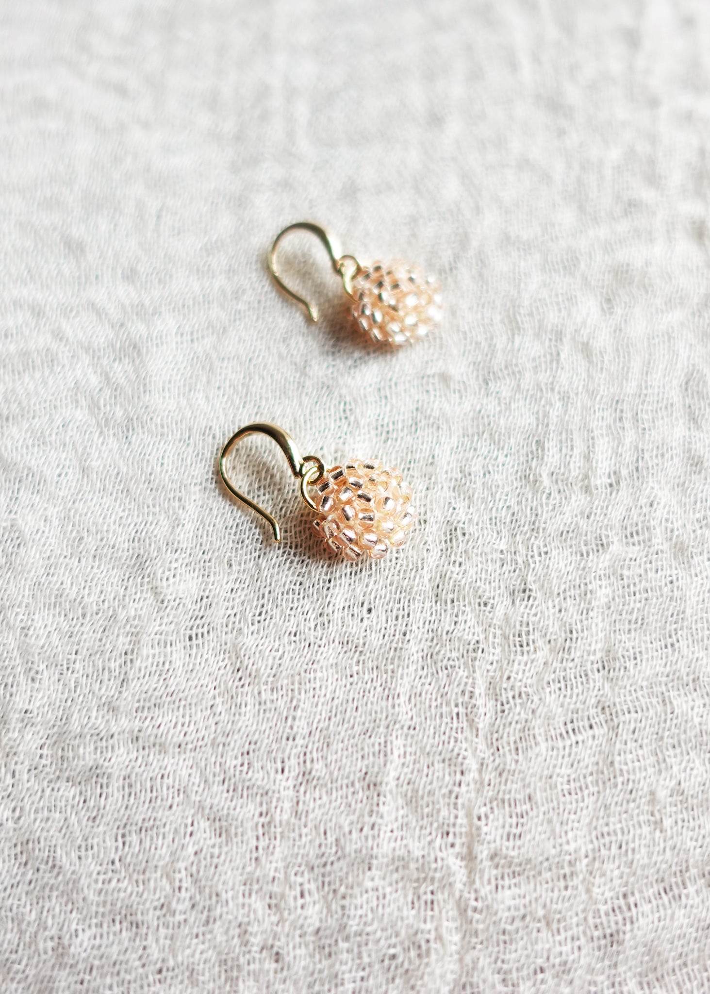 Prelude Drop Earrings in Champagne Pink Side Hook
