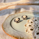 Pug stud earrings front