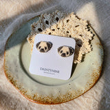 Pug stud earrings on card