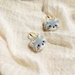 Raccoon Drop Earrings Left