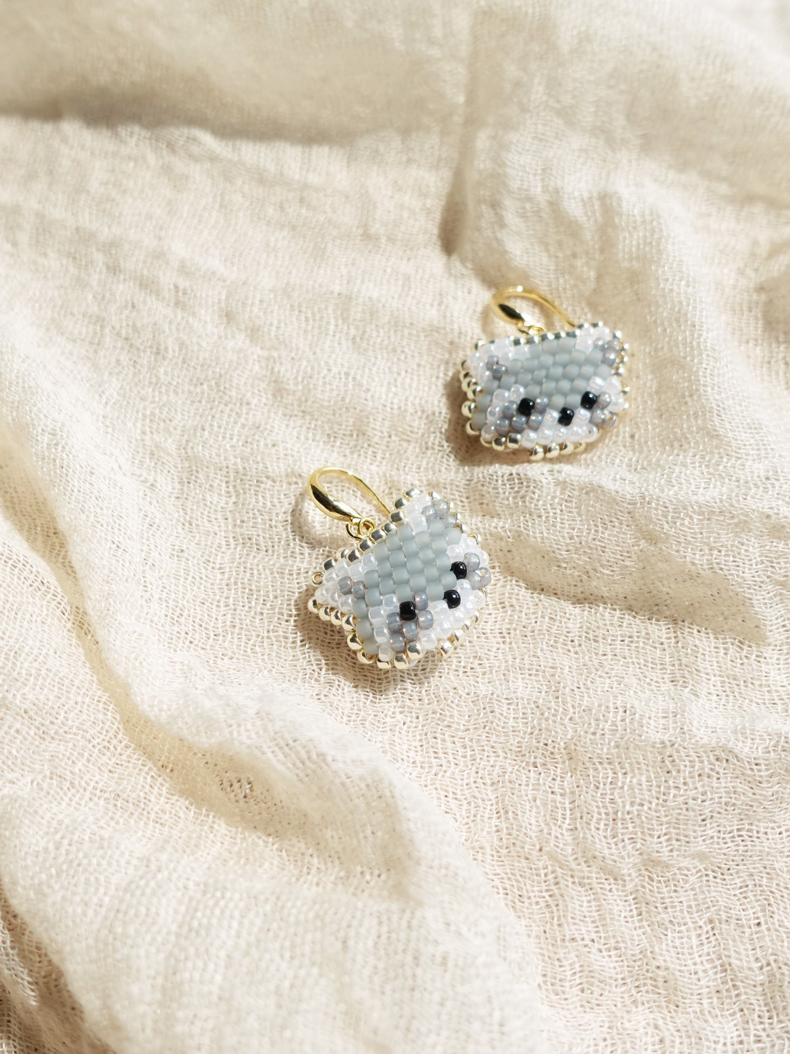 Raccoon Drop Earrings Left