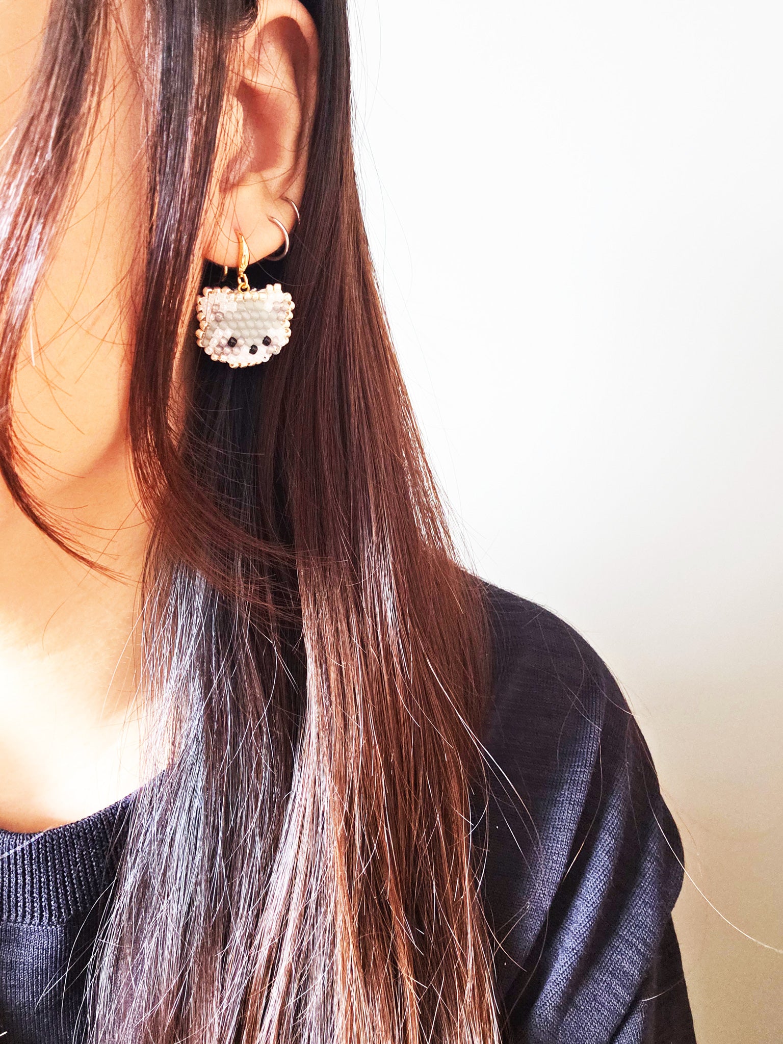 Raccoon Drop Earrings Model