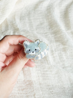 Raccoon Loaf Brooch Pin Held