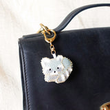 Raccoon Loaf Charm Bag Left