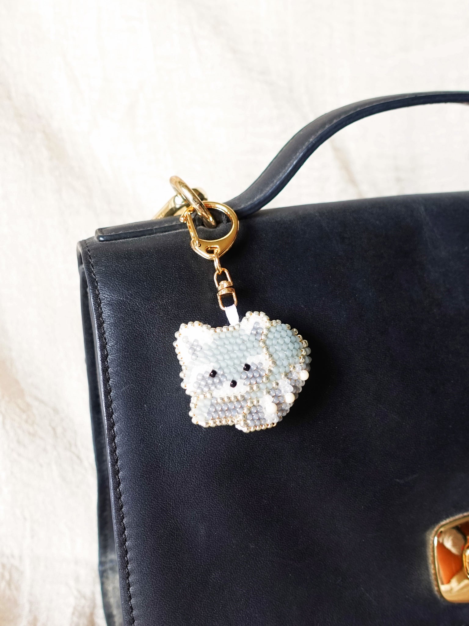 Raccoon Loaf Charm Bag Left