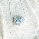 Raccoon Loaf Necklace Front