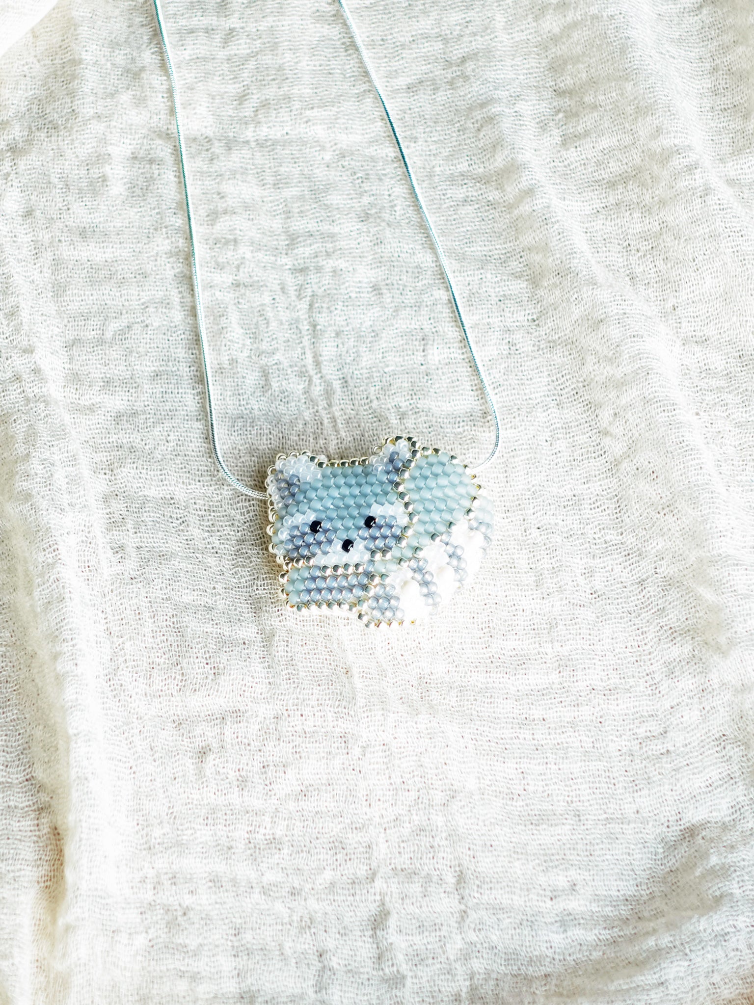 Raccoon Loaf Necklace Front