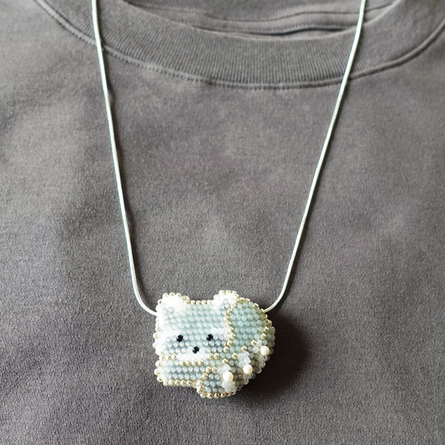 Raccoon Loaf Necklace Front