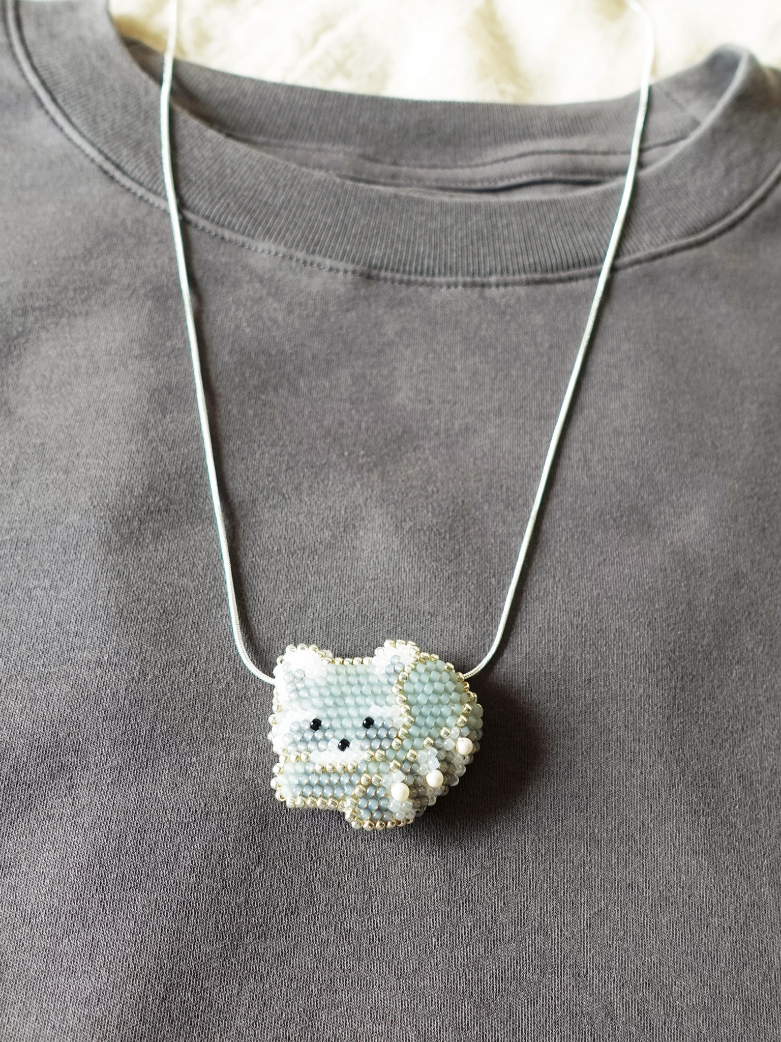 Raccoon Loaf Necklace Front
