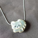 Raccoon Loaf Necklace Shirt Left Close