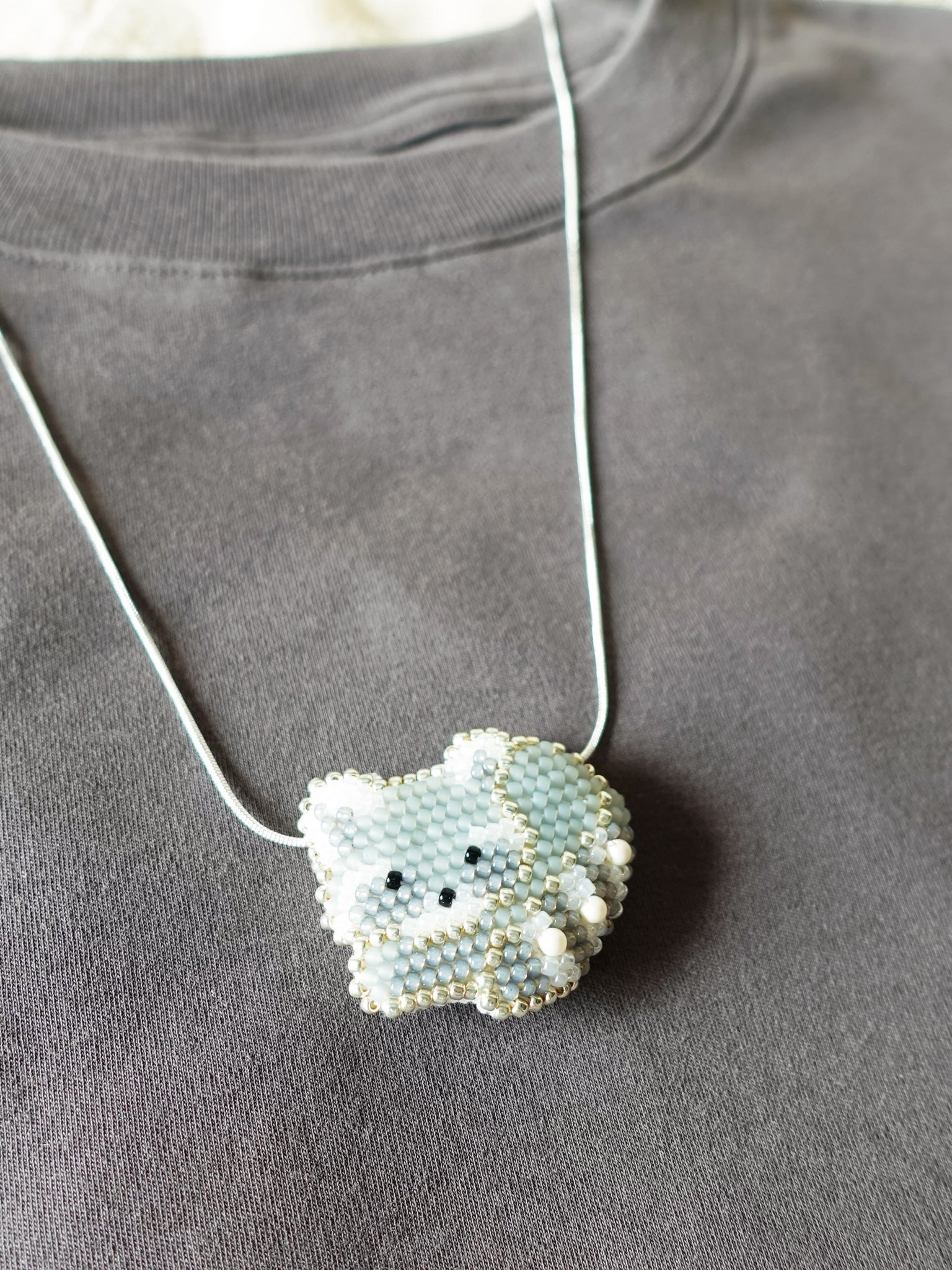 Raccoon Loaf Necklace Shirt Left