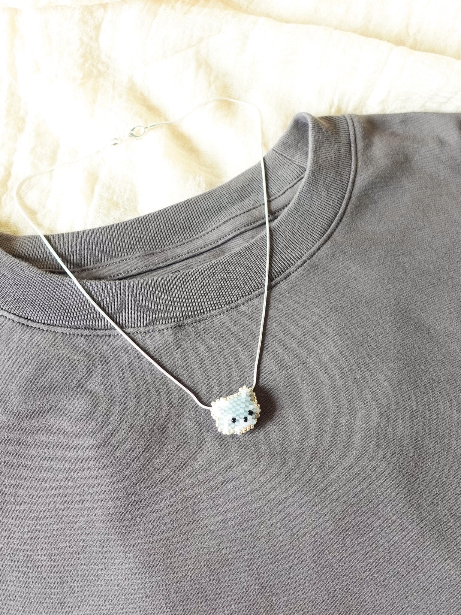 Raccoon Necklace Shirt Left