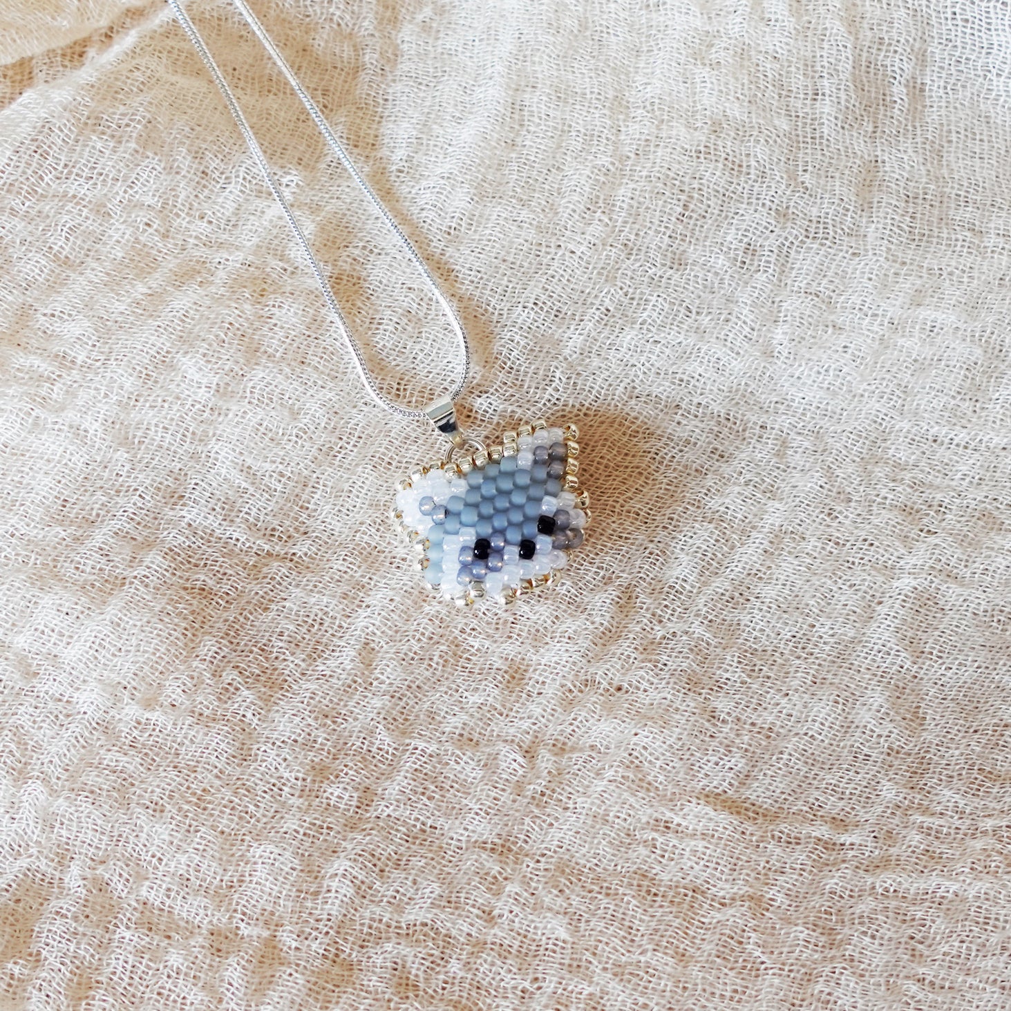 Raccoon Pendant Necklace Left