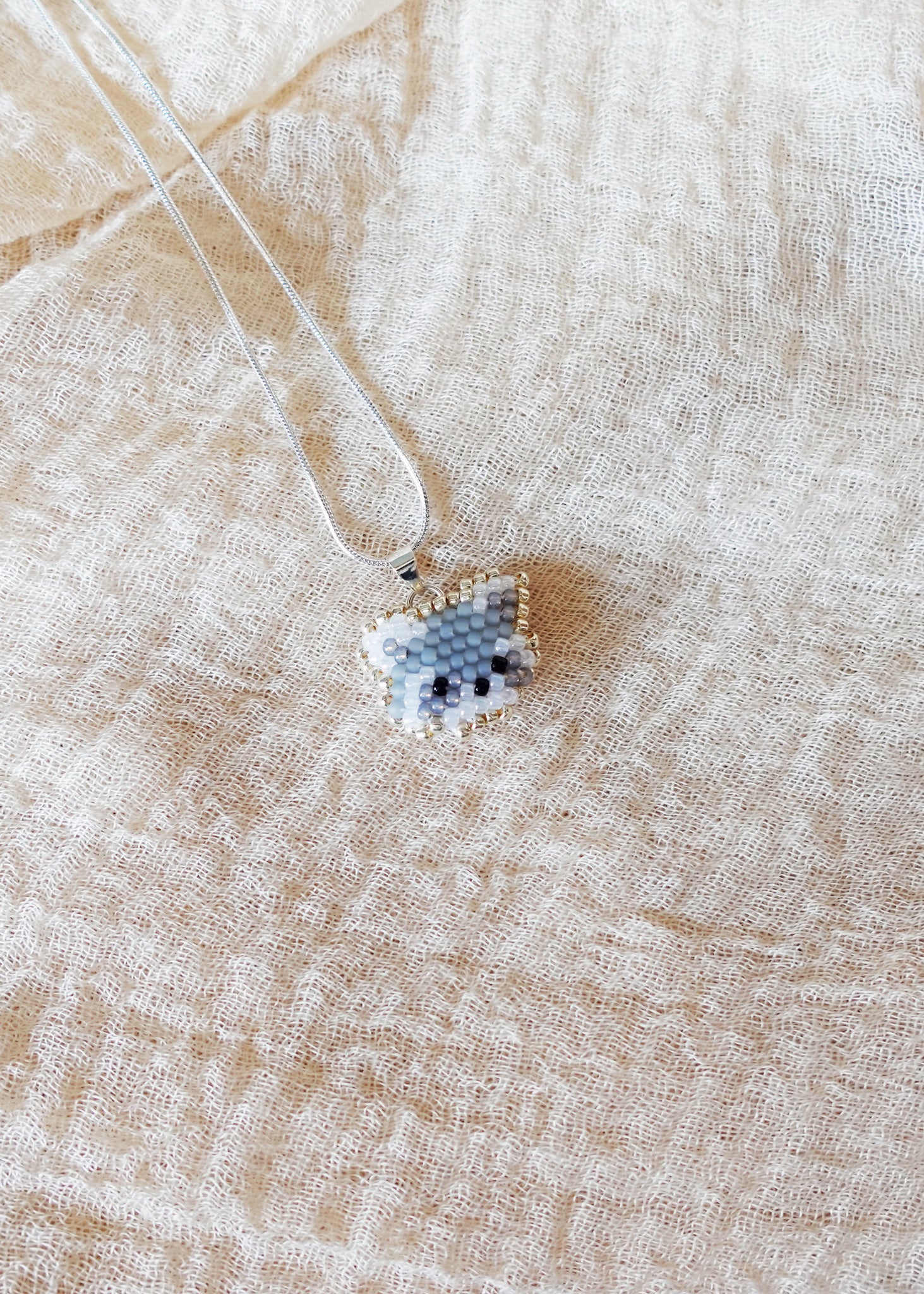 Raccoon Pendant Necklace Left