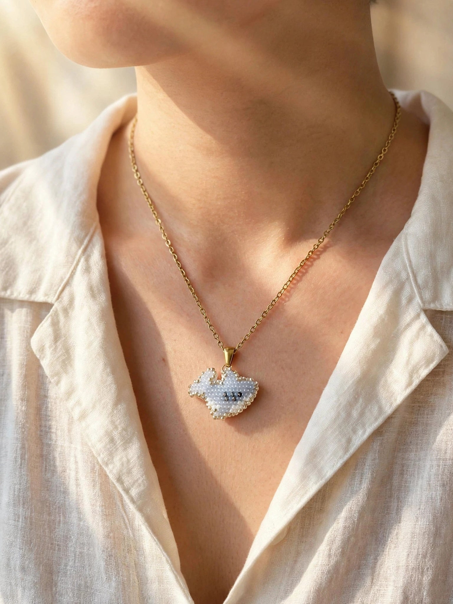 Shark necklace on model
