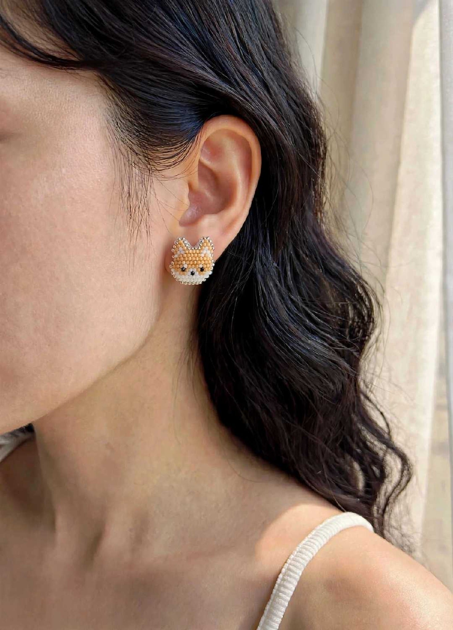 Shiba inu stud earrings on model