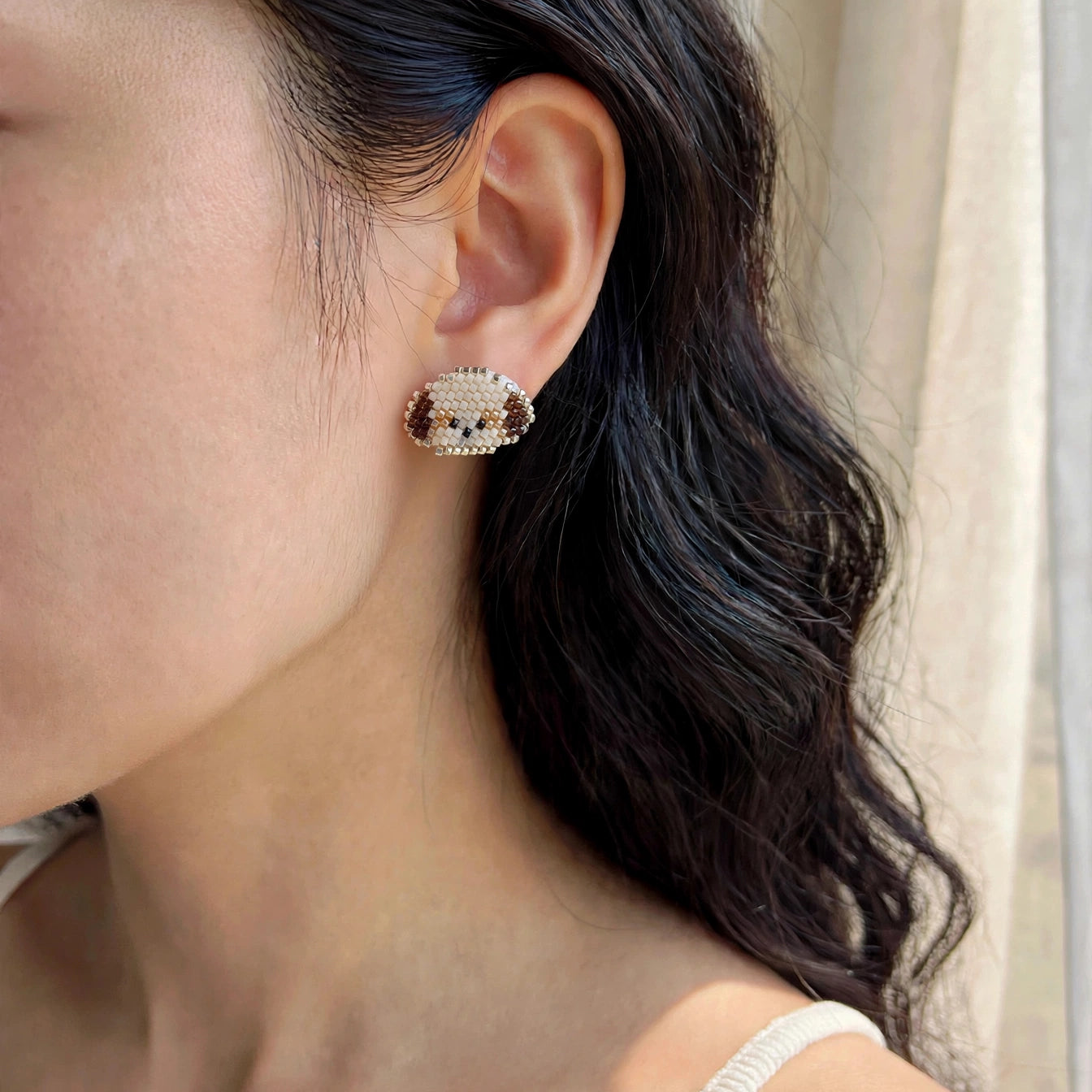 Shih tzu stud earrings on model