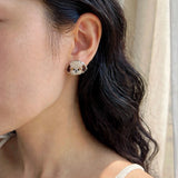 Shih tzu stud earrings on model