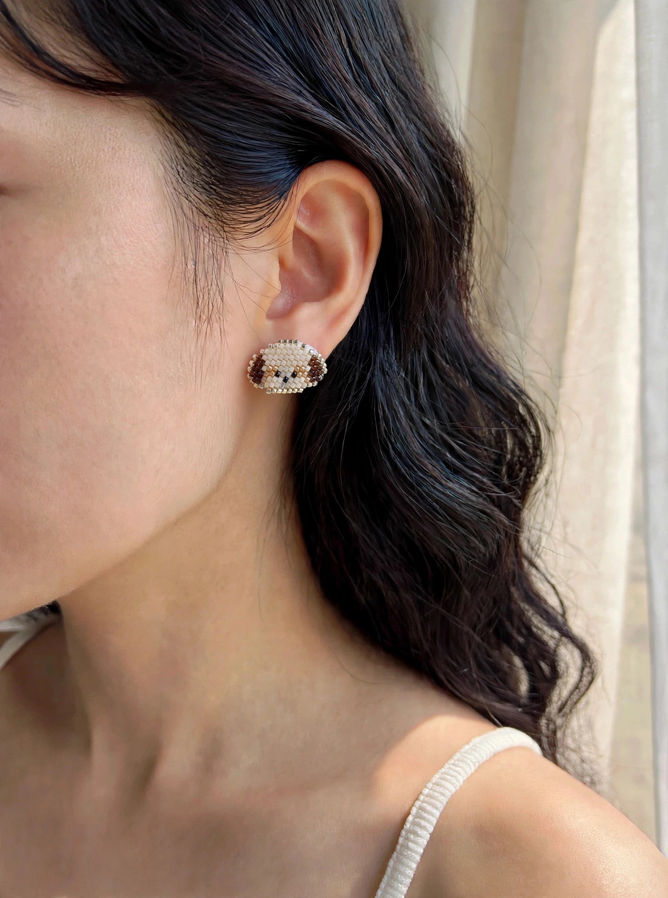 Shih tzu stud earrings on model