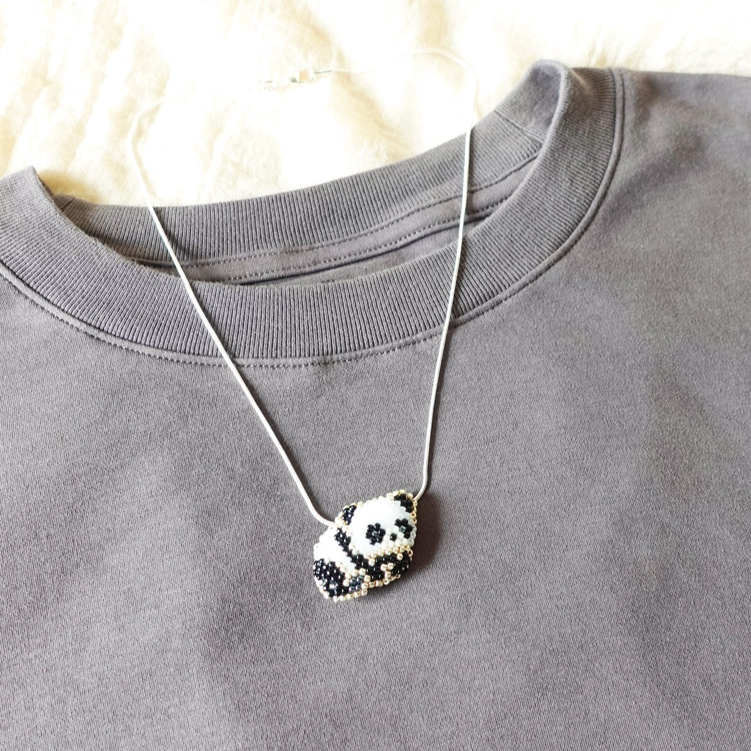 Small Panda Loaf Necklace Shirt Left