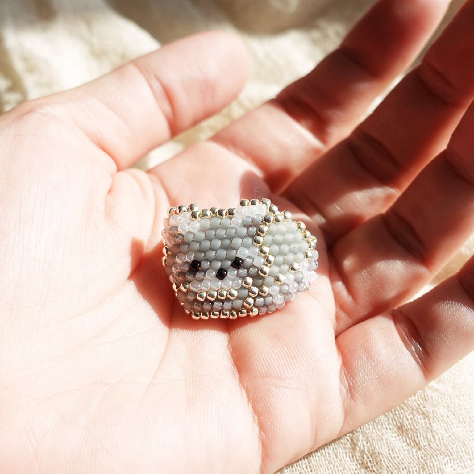Small Raccoon Loaf Brooch Pin Hand