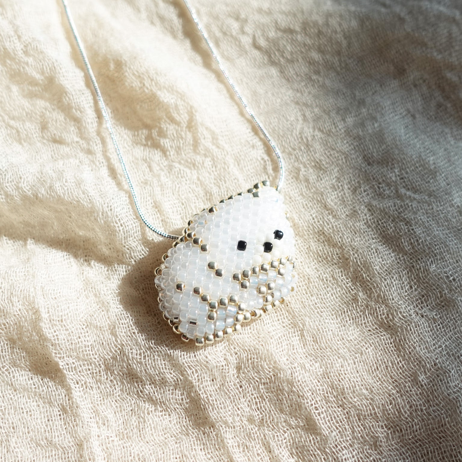 Small White Bear Loaf Necklace Left