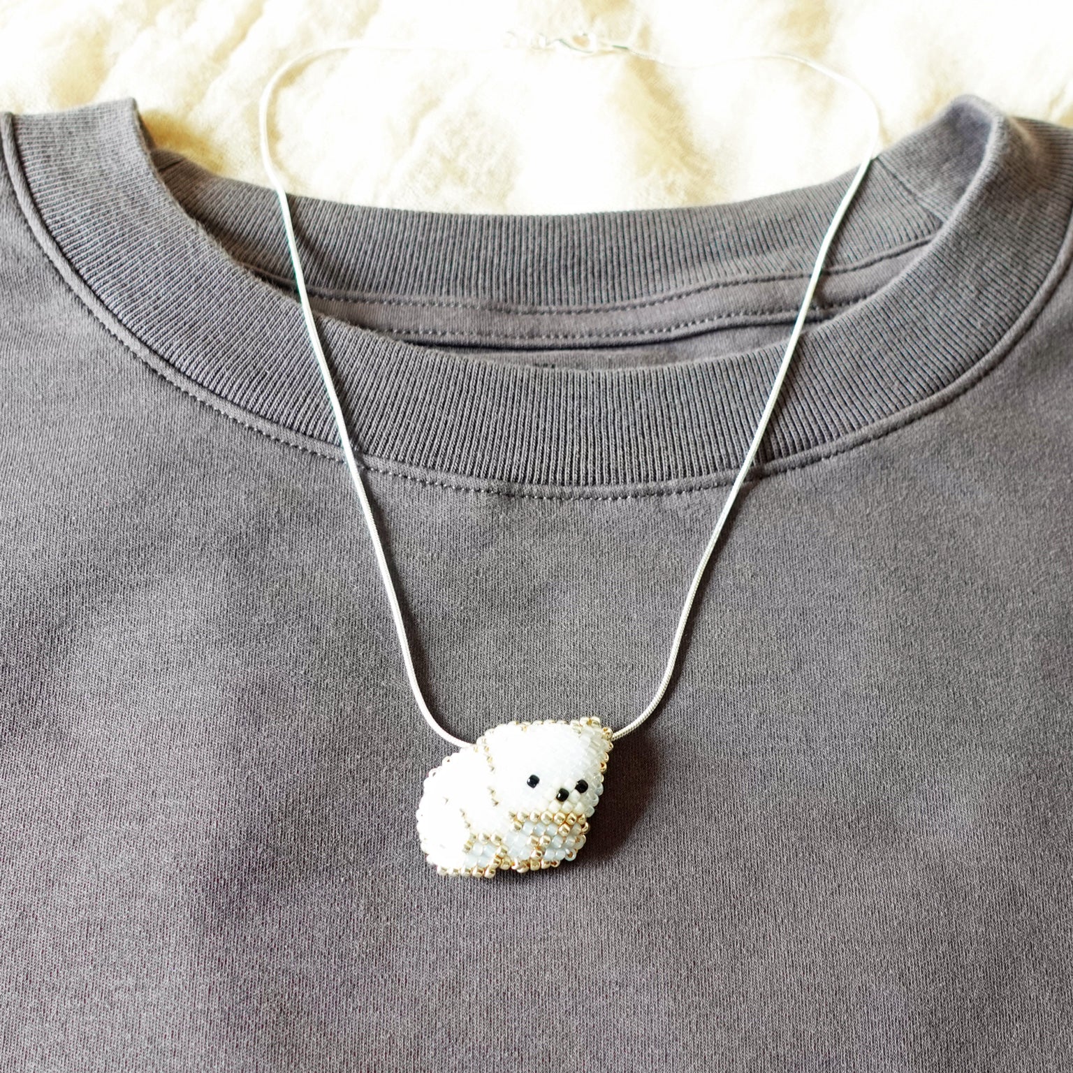Small White Bear Loaf Necklace Shirt Front