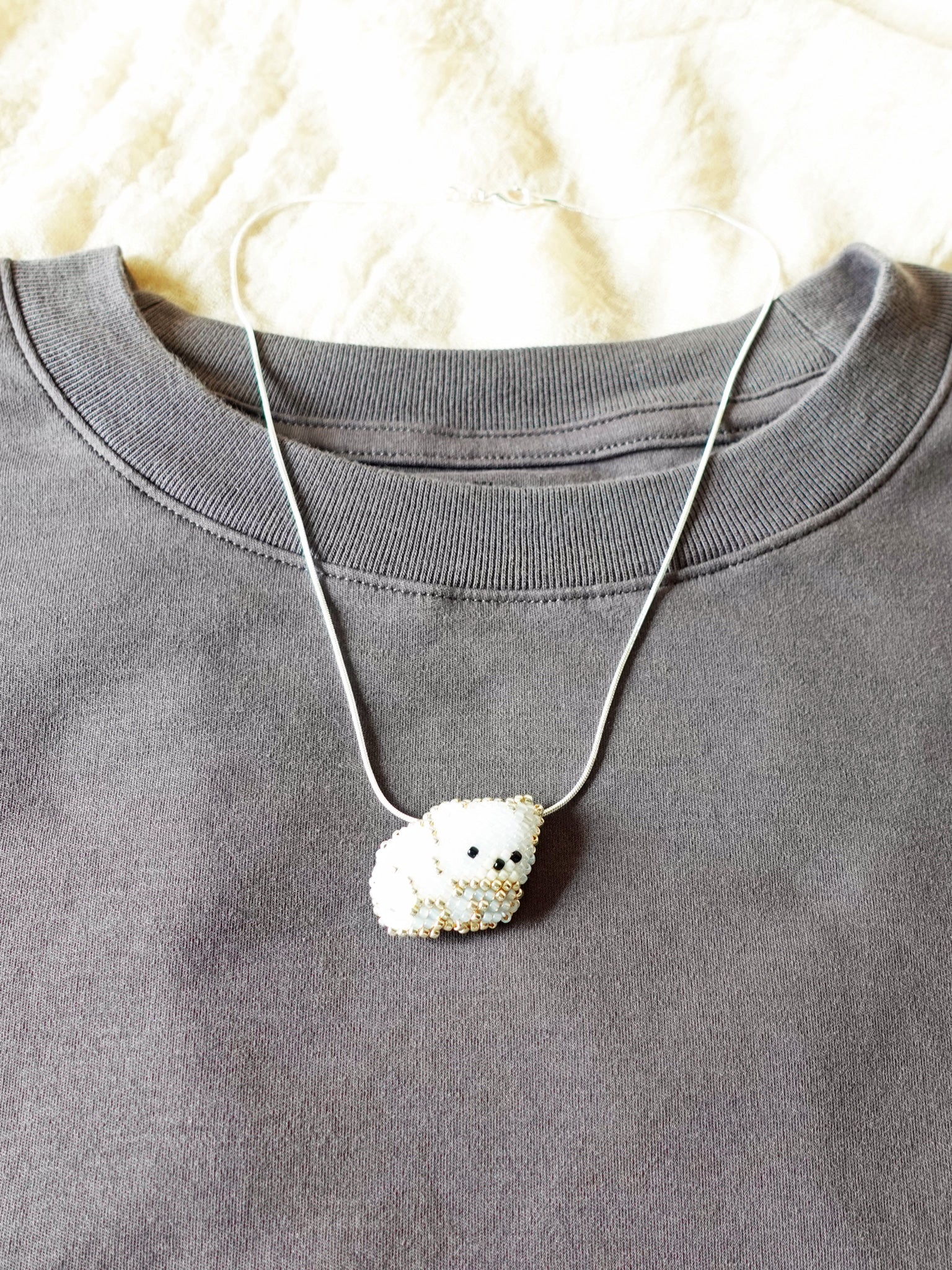 Small White Bear Loaf Necklace Shirt Front