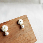 Snowball Star Dust Earrings in Pearl White Display