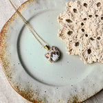 Snowshoe cat necklace left
