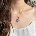Snowshoe cat necklace on model
