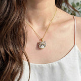 Snowshoe cat necklace on model