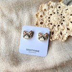 Snowshoe cat stud earrings on cards