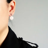 Star Dust Delica Drop Earrings in White Model