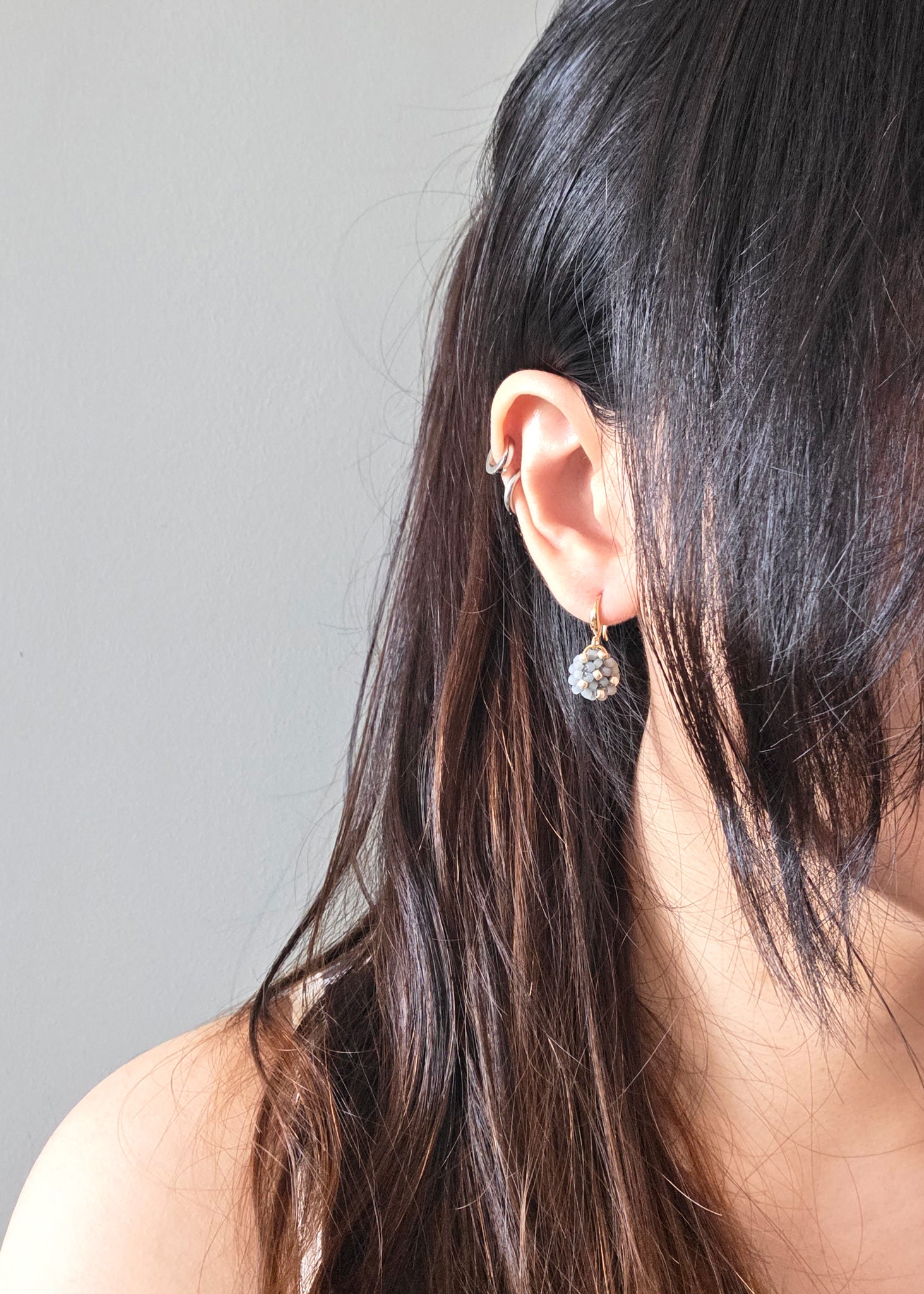 Star Dust Petite Drop Earrings in Smoke Grey Model