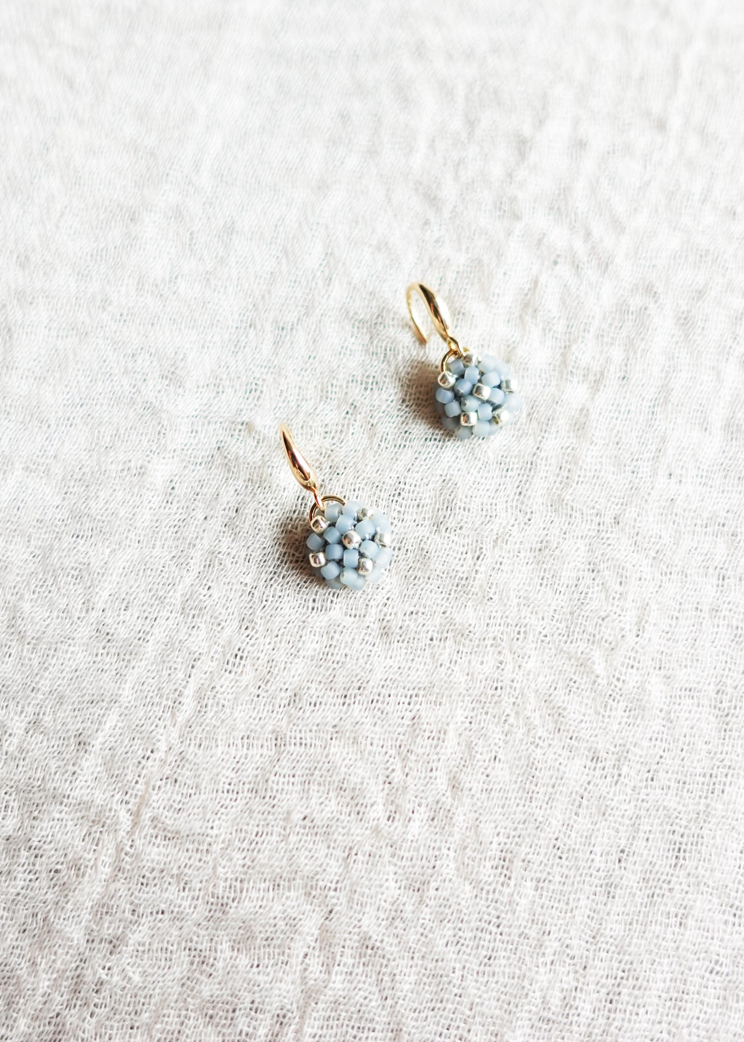 Star Dust Petite Drop Earrings in Smoke Grey Top