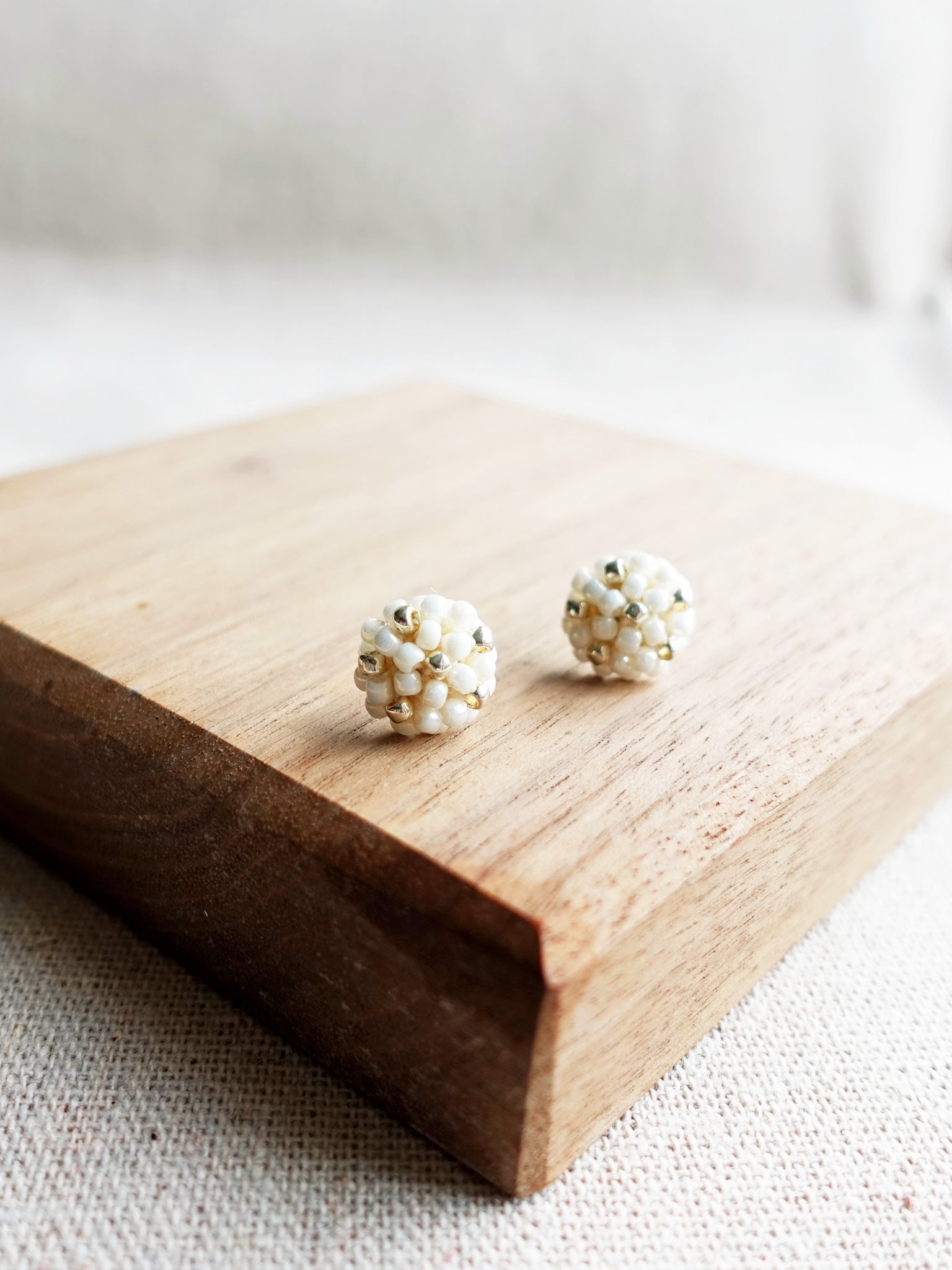 Star Dust Petite Stud Earrings in Pearl White Left