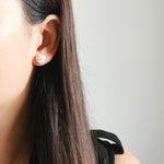 Star Dust Petite Stud Earrings in Pearl White Model