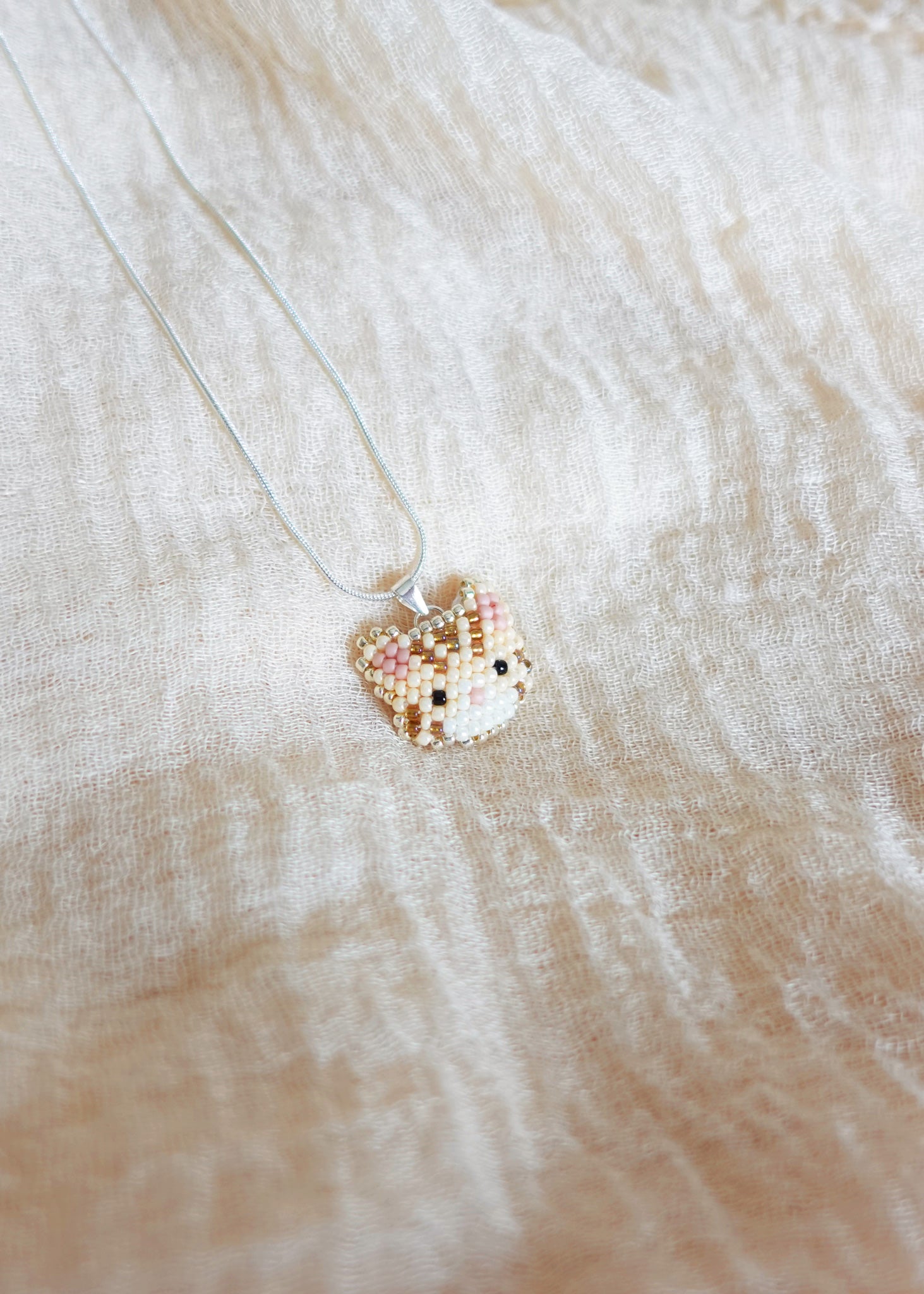 Tabby Cat Necklace in Cream Left