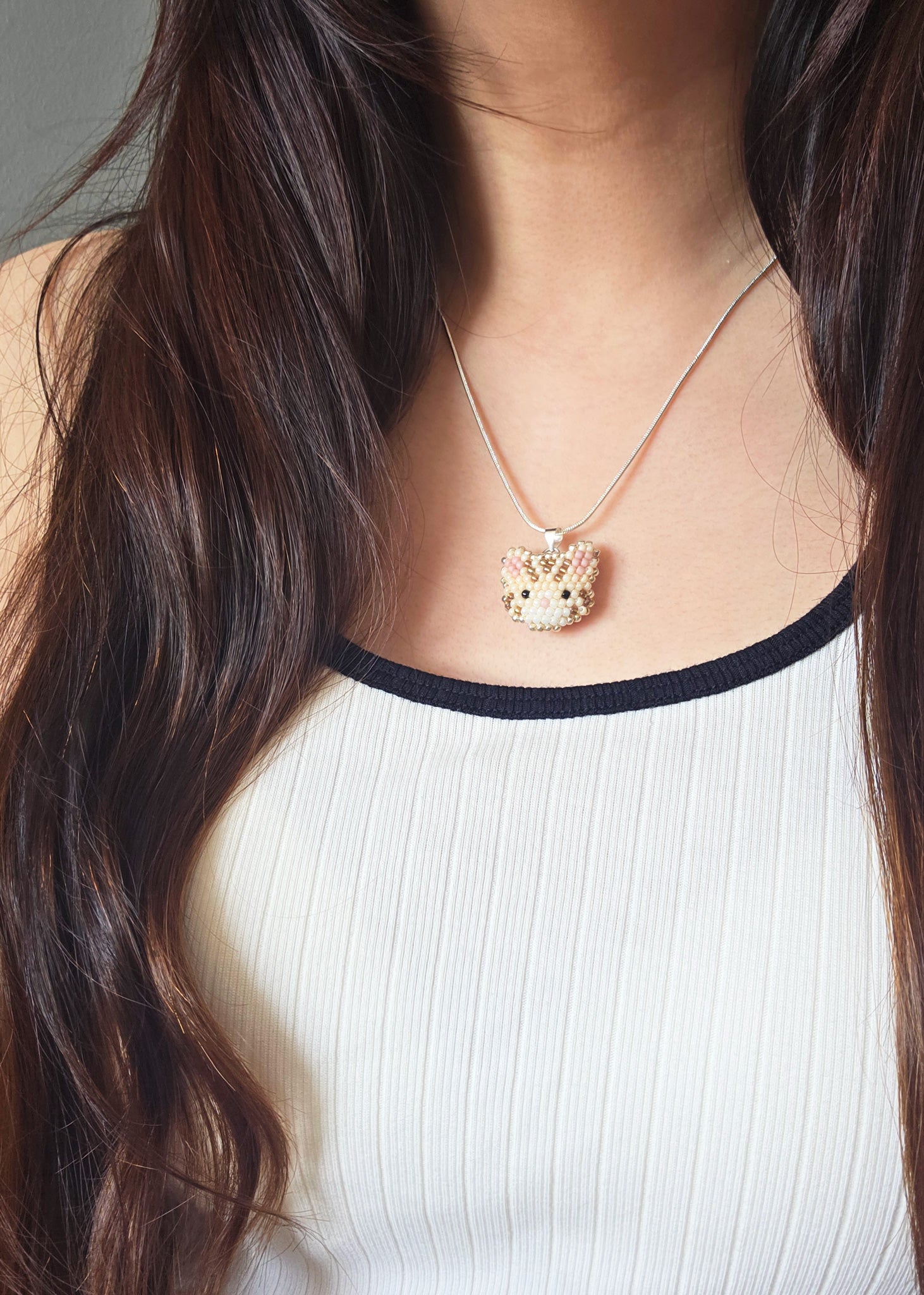 Tabby Cat Necklace in Cream Model