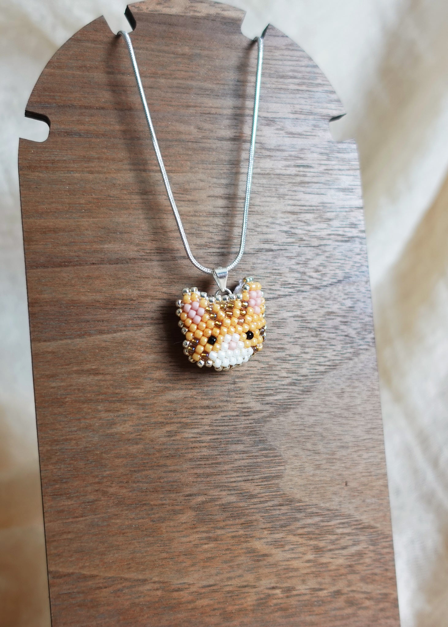 Tabby Cat Necklace in Orange Display Left