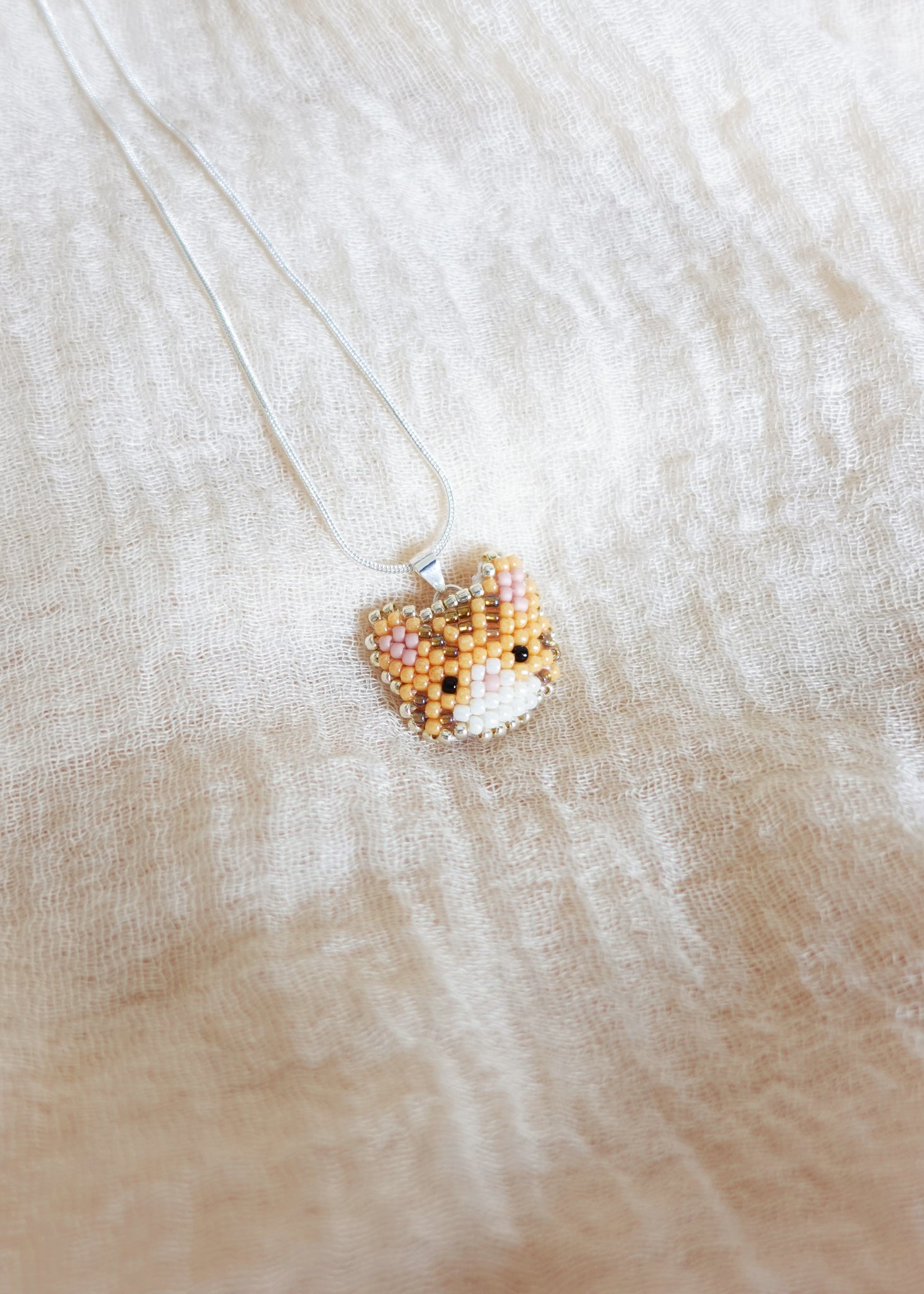 Tabby Cat Necklace in Orange Left