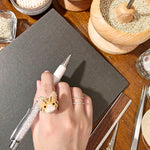 Tabby Cat Ring in Orange Hand