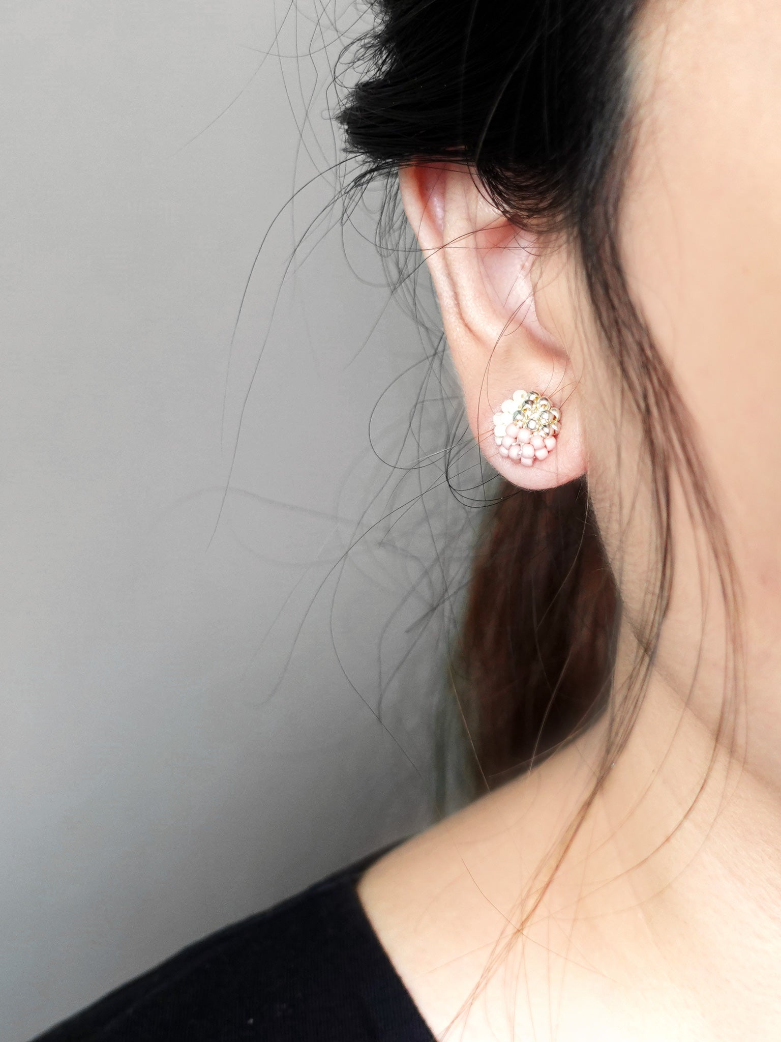 Trio Stud Earrings in Pale Pink Model