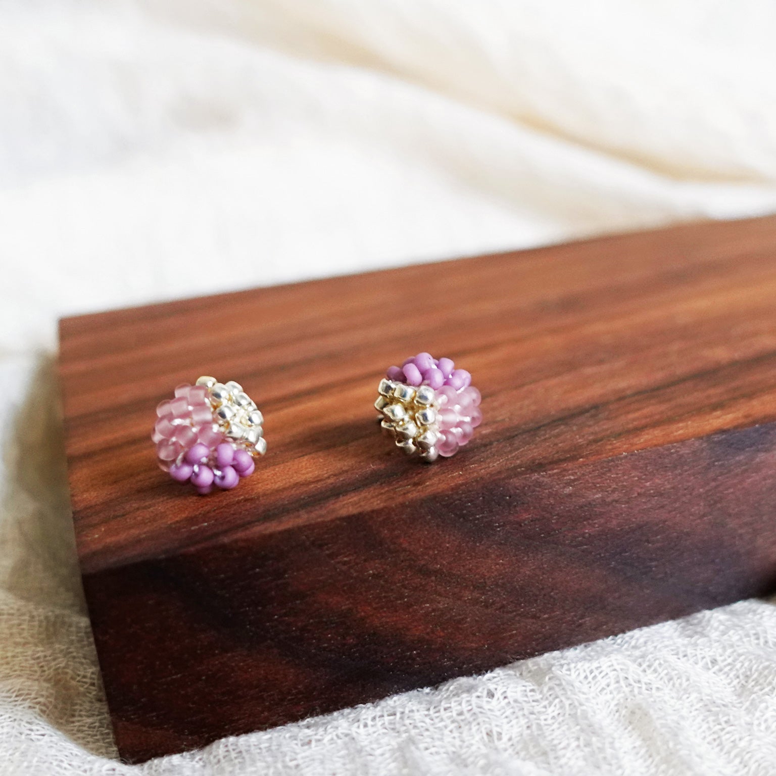 Trio Velvet Stud Earrings in Mauve Purple Display Left